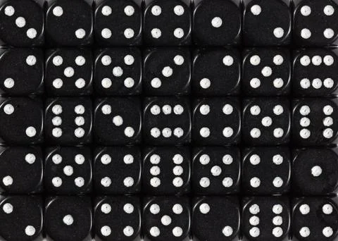 Background pattern of black dices, random ordered Stock Photos