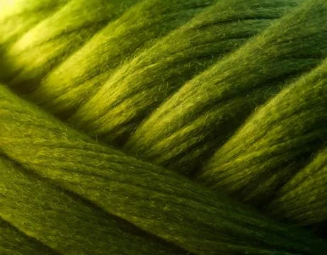 Background pattern composed of green wool threads Stock Photos
