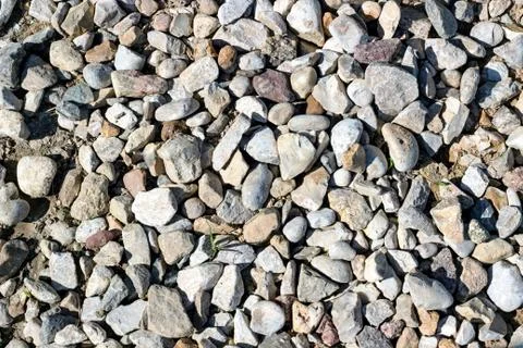 Background pattern, Crushed stone and small stones filled with sun Stock Photos
