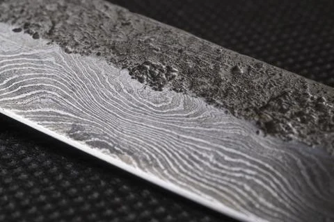 Background with a pattern of Damascus ste Stock Photos