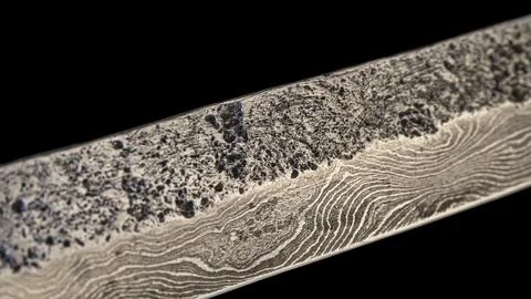 Background with a pattern of Damascus steel 库存照片