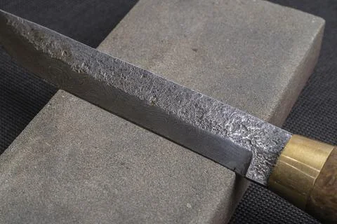 Background with a pattern of Damascus steel Stock Photos