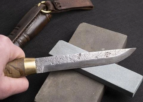 Background with a pattern of Damascus steel Stockfoto's