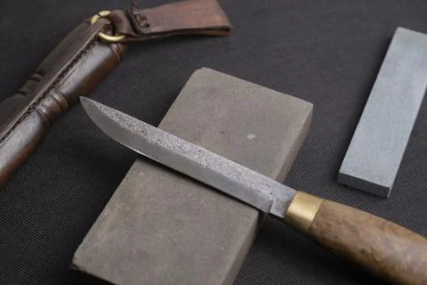 Background with a pattern of Damascus steel Stock Photos