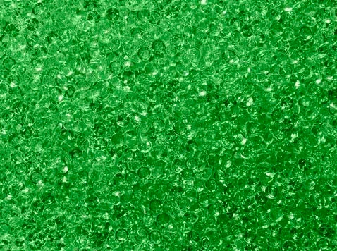 Background pattern of green rhinestone crystals Stock Photos