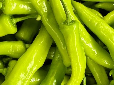 Background pattern of a green sweet chili pepper Foto stock