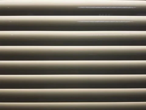 Background pattern of indoor curtain in rows. Stock Photos