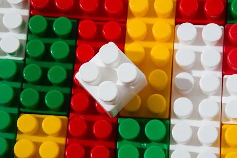 Background pattern of many colored constructor cubes. For the design of the m Fotos de archivo