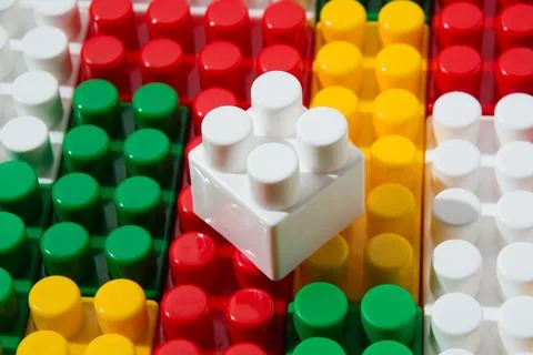 Background pattern of many colored constructor cubes. For the design of the m Fotos de archivo