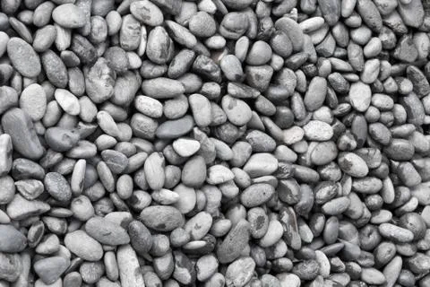 Background Pattern, Naturally Polished Black Rock Pebbles Background. Foto stock