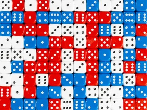 Background pattern of random ordered red, white and blue dices Stock Photos