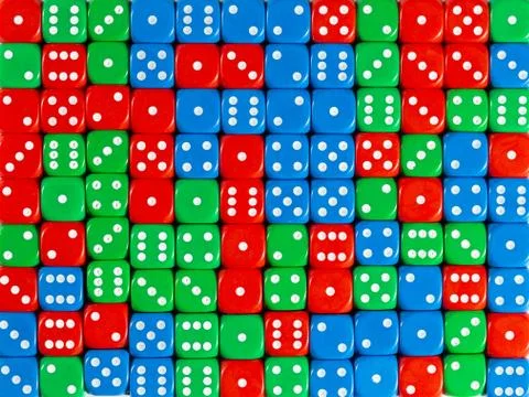 Background pattern of random ordered red, green and blue dices Stock Photos