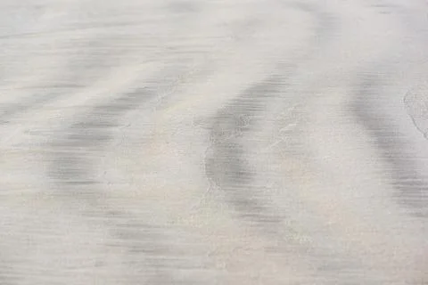 Background pattern of sand on the beach. Stock Photos