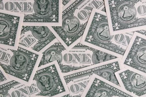 Background Pattern of Scattered One US Dollar Bills Showing Reverse Side Sy.. Foto stock