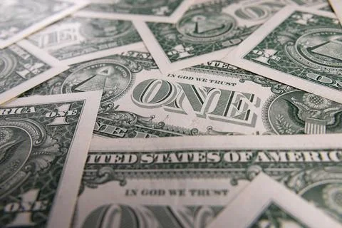 Background Pattern of Scattered One US Dollar Bills Showing Reverse Side Sy.. Foto stock