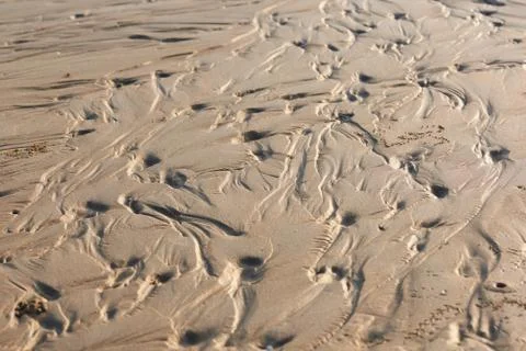 Background pattern of seawaves on the beach Stock Photos