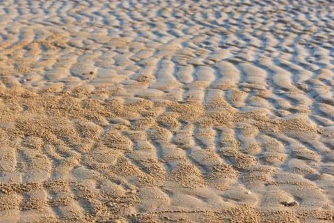 Background pattern of seawaves on the beach Stock Photos