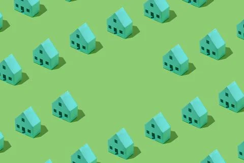 Background pattern of small green model houses 스톡 사진