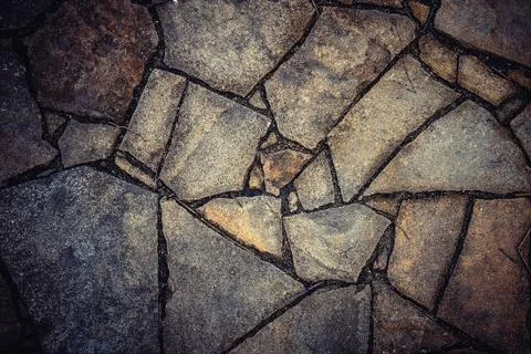Background paved from natural stone of irregular shape Stock Photos