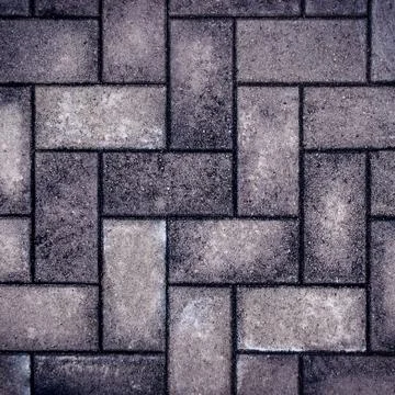 Background pavement, paving stone, brick, cobblestone, road, footpath. Stock Photos