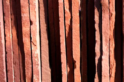 Background from paving stones, rectangular stones in red shades of color 스톡 사진