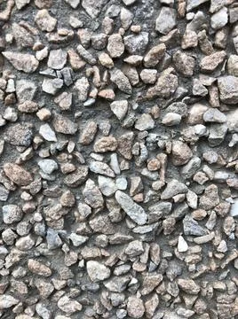 Background pebble in cement background texture decoration Stock Photos