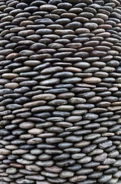 Background of pebbles arranged in order Stock Photos