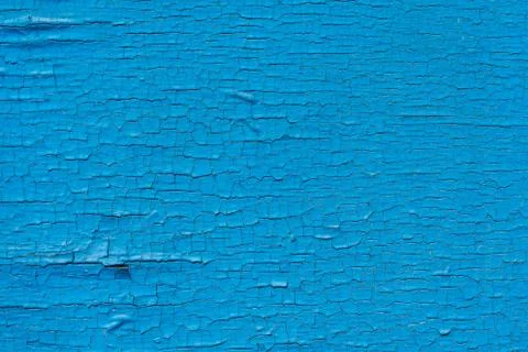 Background of peeling blue paint. Stock Photos