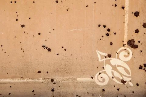 Background of peeling paint and rusty old metal with white frame ornament Stock Photos