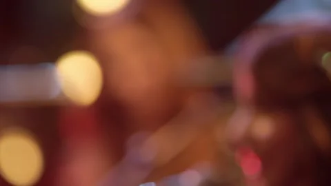 Background performers singing and dancing in live performance Stock Footage 136336060