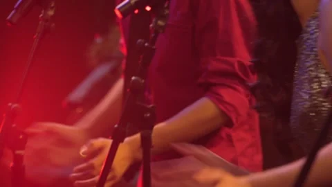 Background performers singing and dancing in live performance Stock Footage 136336083