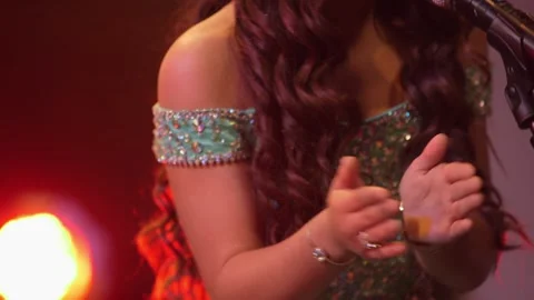 Background performers singing and dancing in live performance Stock Footage 136336228