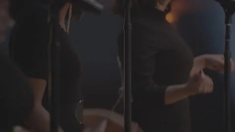 Background performers singing and dancing in live performance Stock Footage 136336652