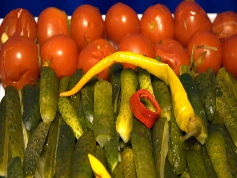 Background pickles tomatoes garlic pepper cucumber closeup Stock Footage 82449747