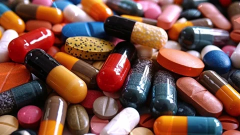The background with the pills. Background with pills. Pill background. Stock Footage 295647960