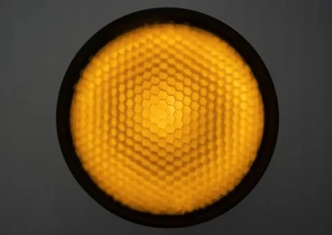 Background of pilot pulsed studio light with a honeycomb grid and diffuse film 库存照片