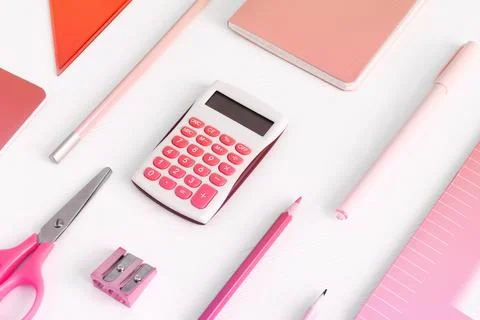 Background with pink office supplies. Folder, notebook, notebook, pencil in Stock Photos
