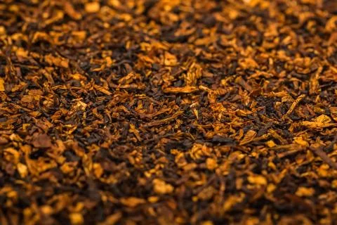 Background is of Pipe Tobacco on a Flat Surface Leaving in Perspective Stock Photos