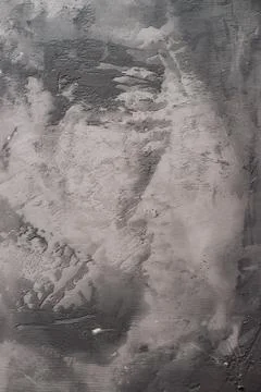Background from plaster decorated with artificial concrete. Drying plaster on Stock Photos