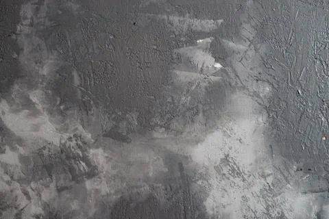 Background from plaster decorated with artificial concrete. Drying plaster on Stock Photos