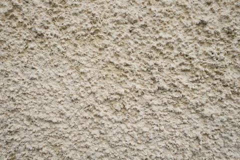 Background plaster, texture yellow old wall. Stock Photos