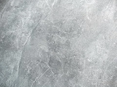 The background is plastered cement grey white. Stock Photos
