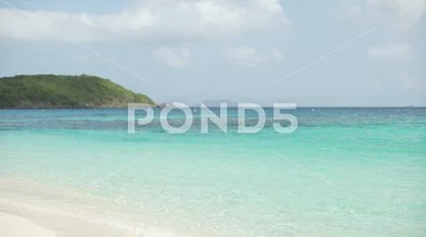Background Plate of High tide on the shore of St John's for green screen Stock Photos