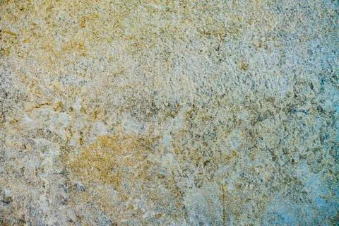 Background of a plate from a multi-colored polished stone. Stockfoto's