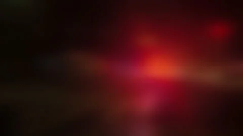 Background Plate: Out of Focus Bokeh of Flashing Police Lights at Night Stock Footage 157897267