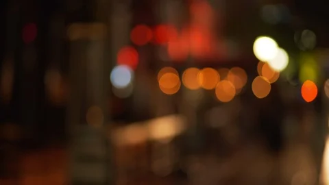 Background plate of out of focus city street sidewalk at night with pedestrians Stock-Footage 89924800