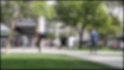 Background Plate-People moving walking around urban park setting-Blurred Stock Footage 100992146
