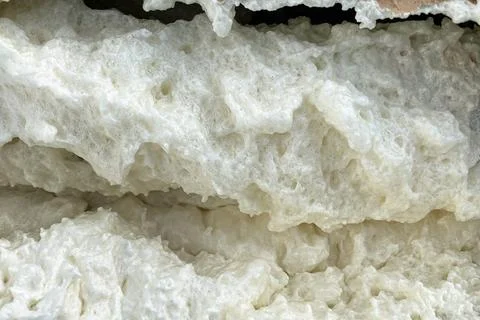 Background polyurethane foam for thermal insulation of walls Stock Photos