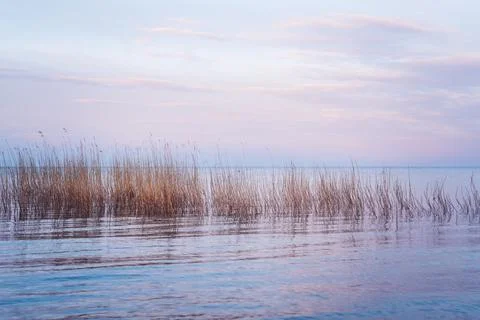 Background of pre-sunset clouds in the lake Stock Photos