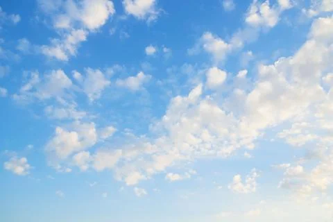 Background of puffy clouds and blue sky Stock Photos